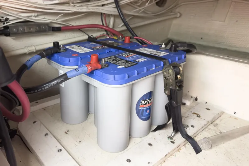 Slide: The Image of Battery setup in a 1971 Hatteras 53 Motor Yacht engine room. - 72