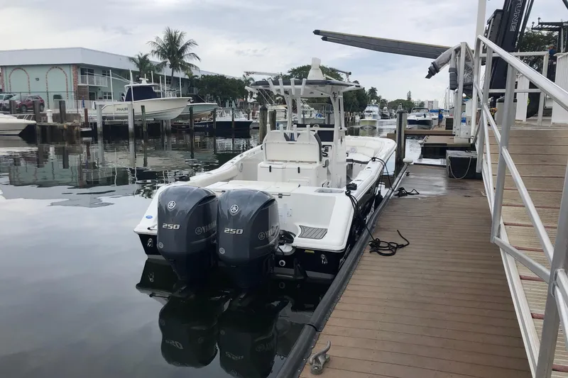 Slide: The Image of 2016 Tidewater 280 CC Adventure boat docked with twin Yamaha 250 engines. - 3