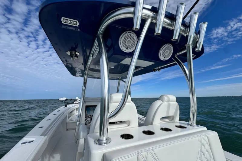 Slide: The Image of 2024 Front Runner 33 Center Console boat on open water, featuring sleek design and modern amenities. - 19