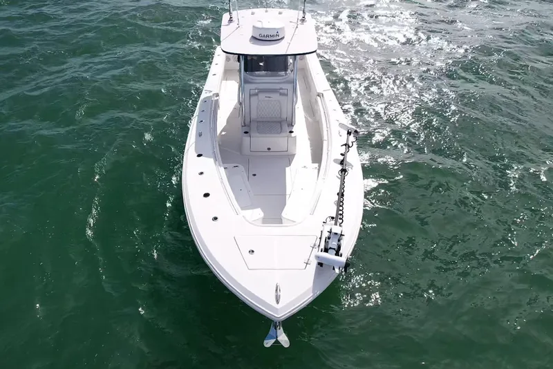 Slide: The Image of 2024 Front Runner 33 Center Console boat on open water, aerial view. - 6