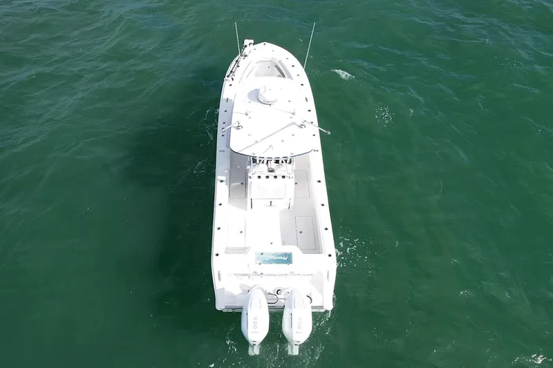 Slide: The Image of 2024 Front Runner 33 Center Console boat on open water, aerial view. - 7