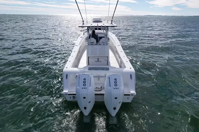 Slide: The Image of 2024 Front Runner 33 Center Console boat on open water, rear view. - 8