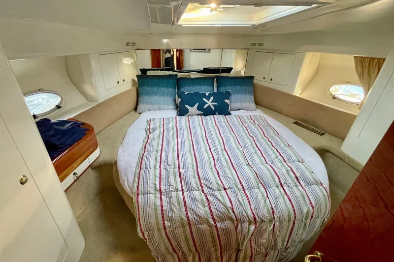 Slide: The Image of Luxurious cabin interior of 2003 Cranchi Atlantique 40 yacht with cozy bedding. - 14