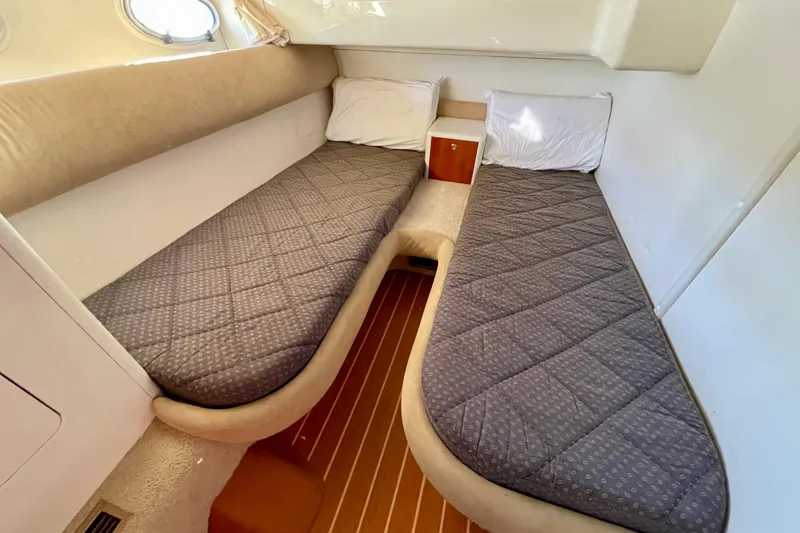 Slide: The Image of Twin cabin interior of 2003 Cranchi Atlantique 40 yacht with gray bedding. - 16