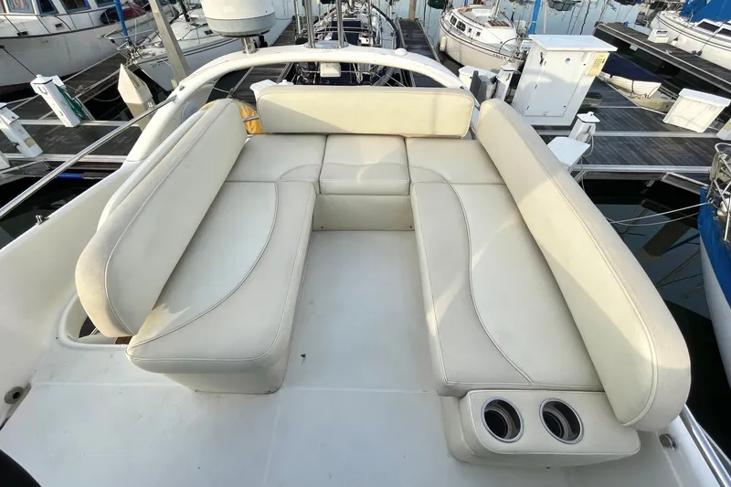 Slide: The Image of Luxurious seating on 2003 Cranchi Atlantique 40 yacht, docked at marina. - 21