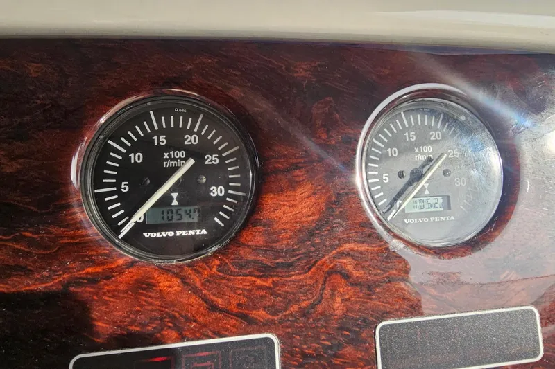 Slide: The Image of Volvo Penta gauges on 2003 Cranchi Atlantique 40 boat dashboard, displaying RPM readings. - 25