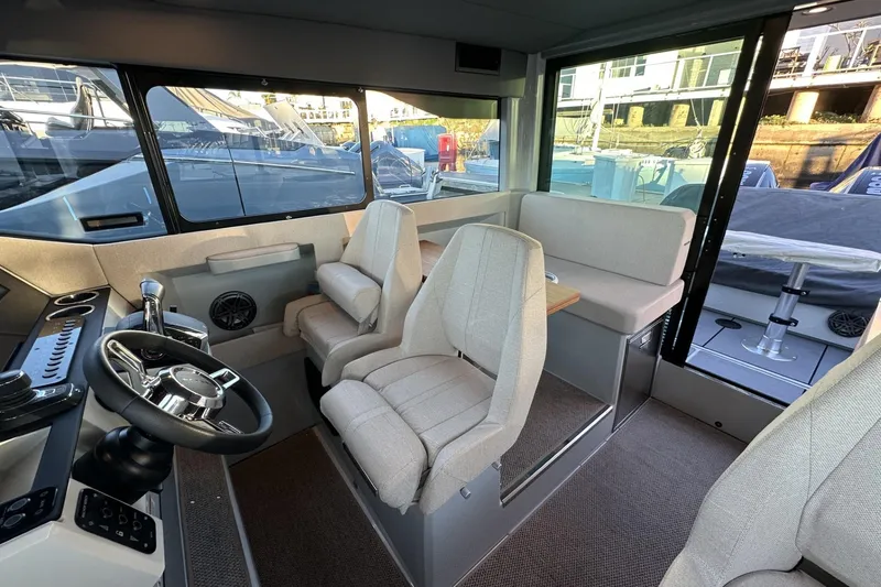 Slide: The Image of 2024 Saxdor 320 GTC interior with modern helm, seating, and panoramic windows. - 63
