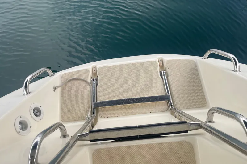 Slide: The Image of 2008 Caliber center cockpit cutter deck with seating and covered equipment. - 17