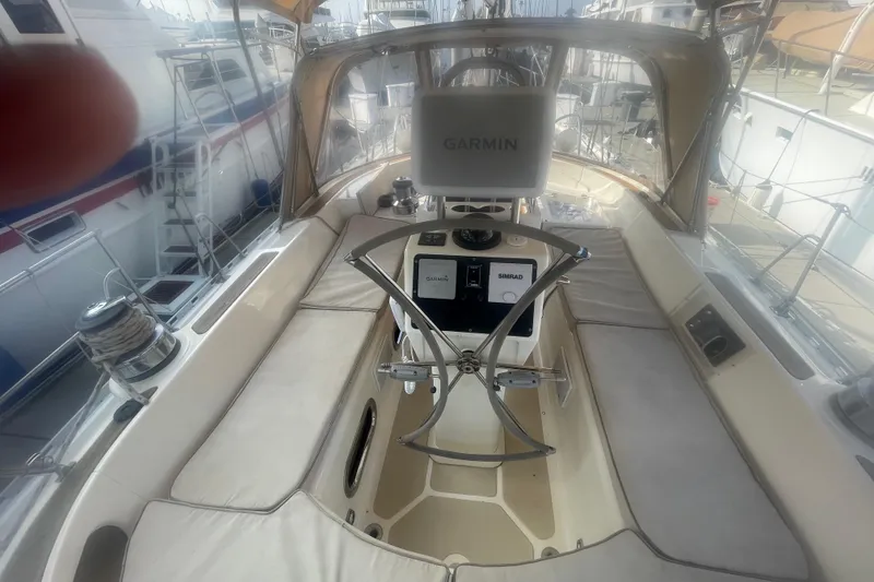 Slide: The Image of 2008 Caliber 47 LRC yacht docked in marina, surrounded by other boats. - 21