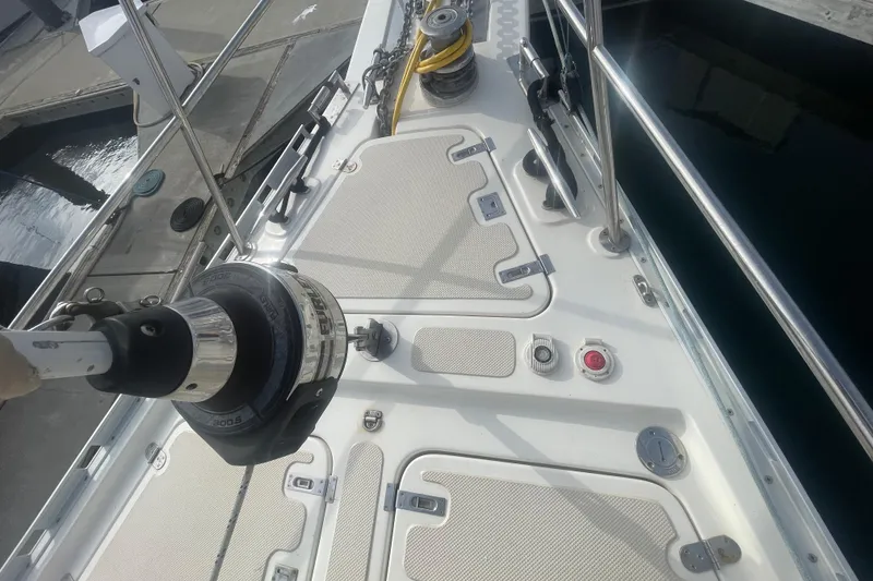 Slide: The Image of 2008 Caliber center cockpit cutter with Garmin navigation, docked in a marina. - 26