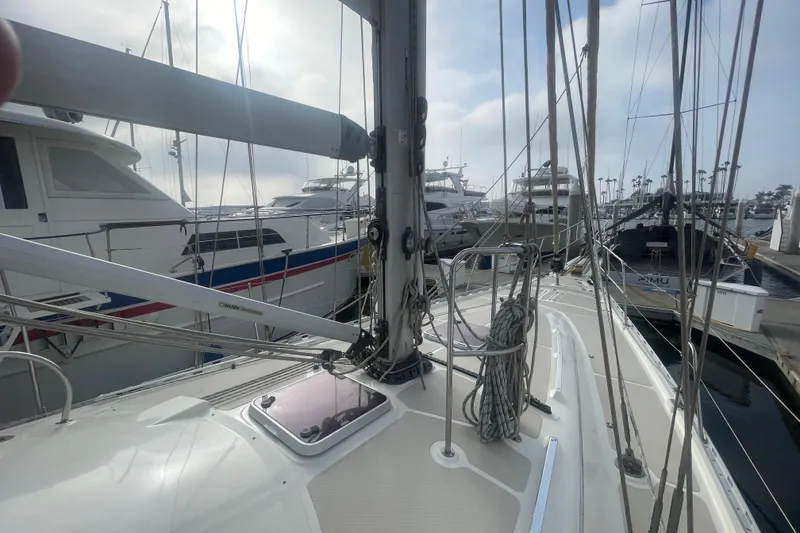 Slide: The Image of Luxurious interior of 2008 Caliber 47 LRC yacht with wood finishes and cozy seating. - 27