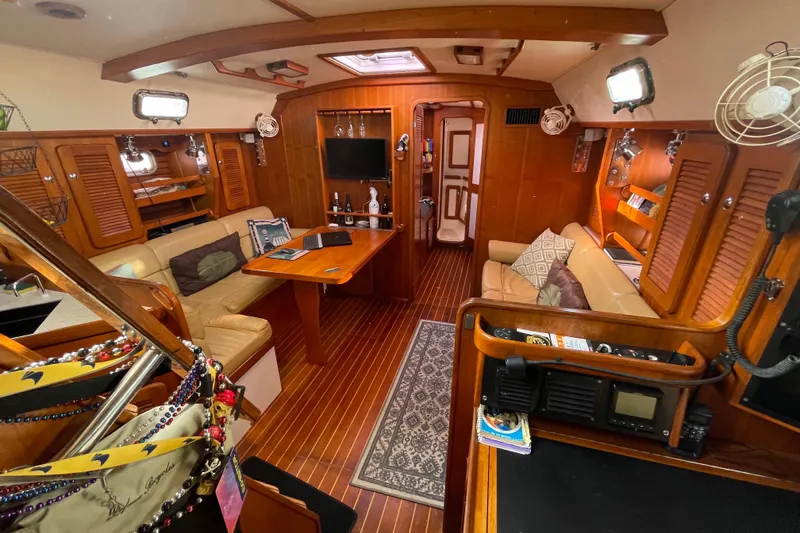Slide: The Image of Luxurious 2008 Caliber center cockpit cutter interior with wood finish and cozy seating area. - 32