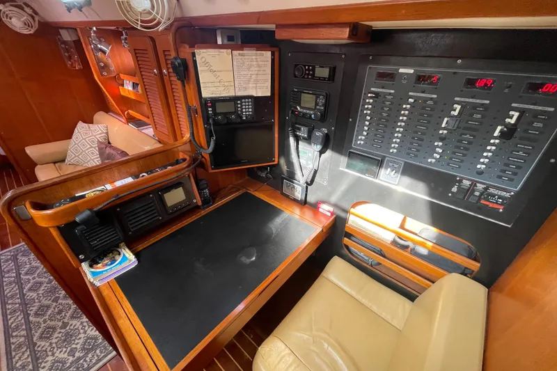 Slide: The Image of Luxurious interior of 2008 Caliber 47 LRC yacht with elegant wood finish and cozy seating. - 34
