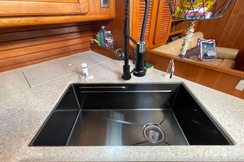 Slide: The Image of Luxurious 2008 Caliber center cockpit cutter interior with wood finish and cozy seating. - 40