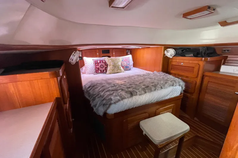 Slide: The Image of 2008 Caliber center cockpit cutter navigation station with control panels and seating. - 44