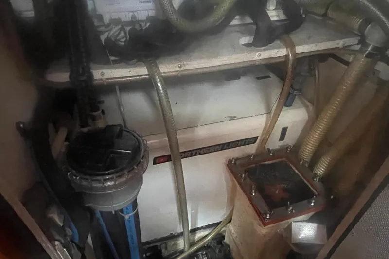 Slide: The Image of 2008 Caliber center cockpit cutter bathroom with shower and wooden accents. - 63