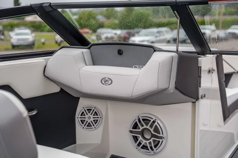 Slide: The Image of 2026 Cobalt CS22 boat interior with sleek seating and modern speaker system. - 10