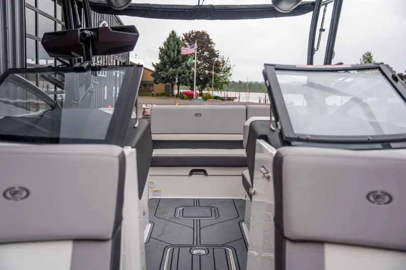 Slide: The Image of 2026 Cobalt CS22 boat interior with sleek seating and modern design. - 12
