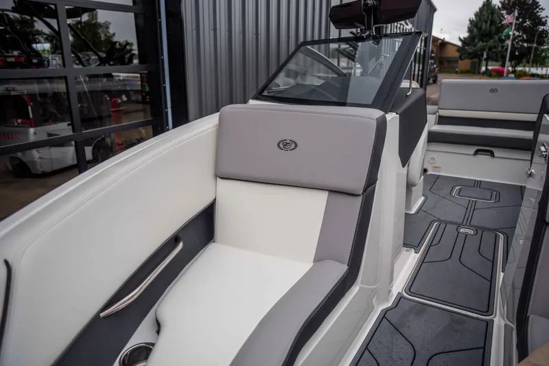 Slide: The Image of 2026 Cobalt CS22 boat interior with sleek seating and modern design. - 13