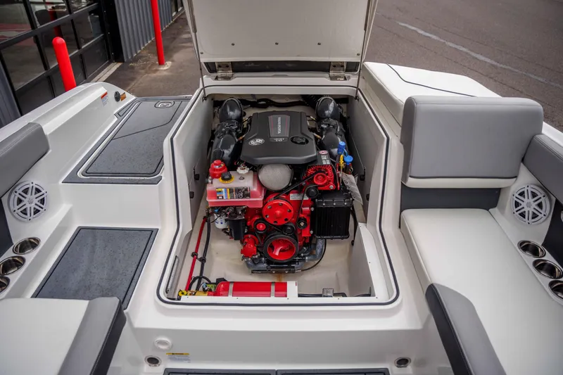 Slide: The Image of 2026 Cobalt CS22 boat engine compartment with open hatch, showcasing modern design and components. - 17