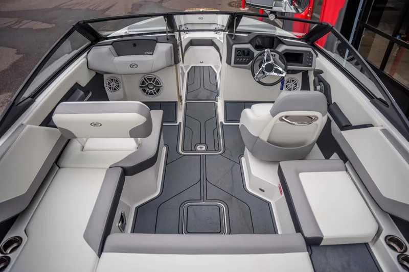 Slide: The Image of 2026 Cobalt CS22 boat interior with modern seating and sleek dashboard design. - 5