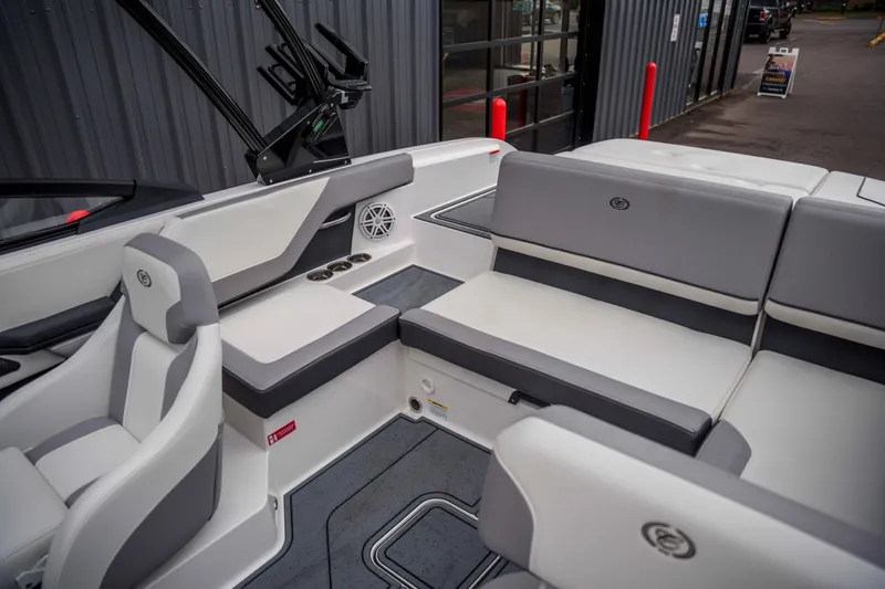 Slide: The Image of 2026 Cobalt CS22 boat interior with gray and white seating, showcasing modern design. - 8