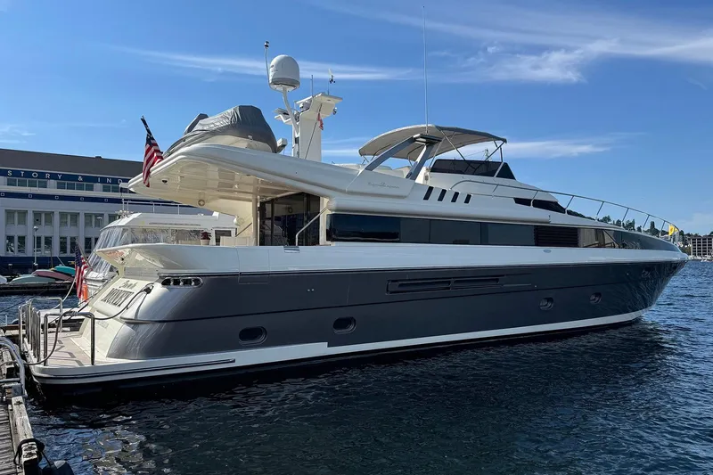 The Image of Luxury Dyna Laguna yacht docked at marina under clear blue sky. - 1