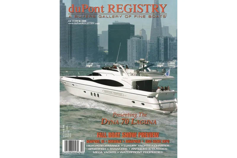 Slide: The Image of Luxury yacht Dyna Z0 Laguna cruising near city skyline, featured in duPont Registry magazine. - 4