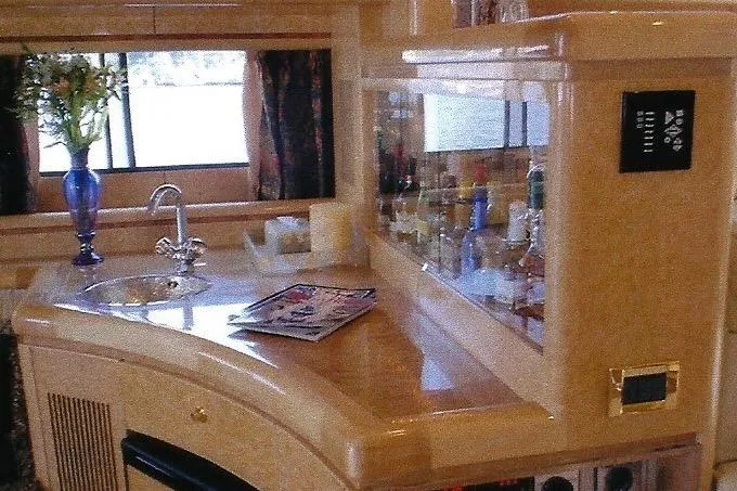 Slide: The Image of Luxurious Dyna Laguna yacht interior with elegant kitchen counter and floral decor. - 40