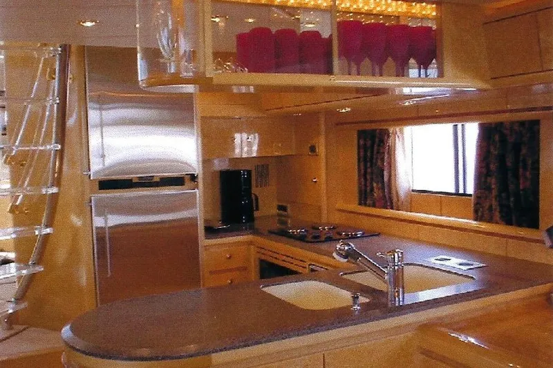 Slide: The Image of Luxurious Dyna Laguna yacht kitchen with modern appliances and elegant design. - 44