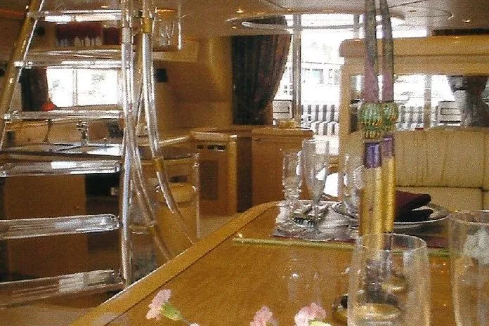 Slide: The Image of Luxurious interior of a Dyna Laguna yacht with elegant dining setup. - 46