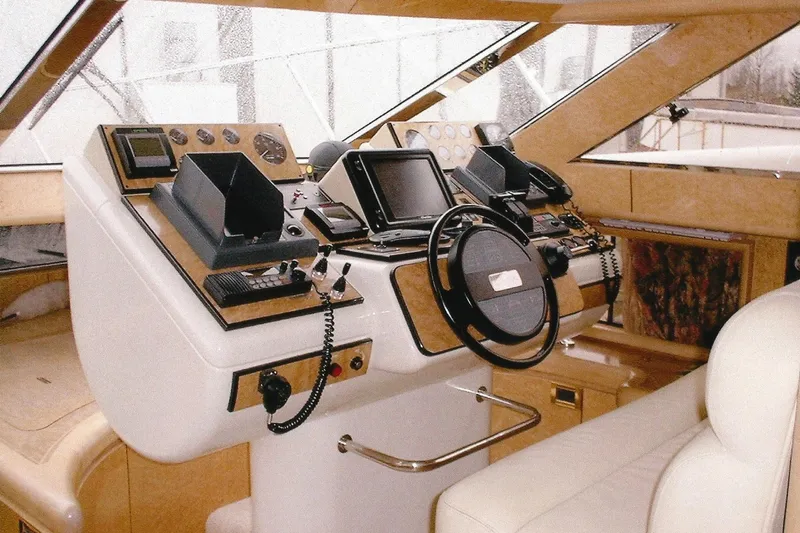 Slide: The Image of Luxurious Dyna Laguna yacht cockpit with advanced navigation controls and plush seating. - 50
