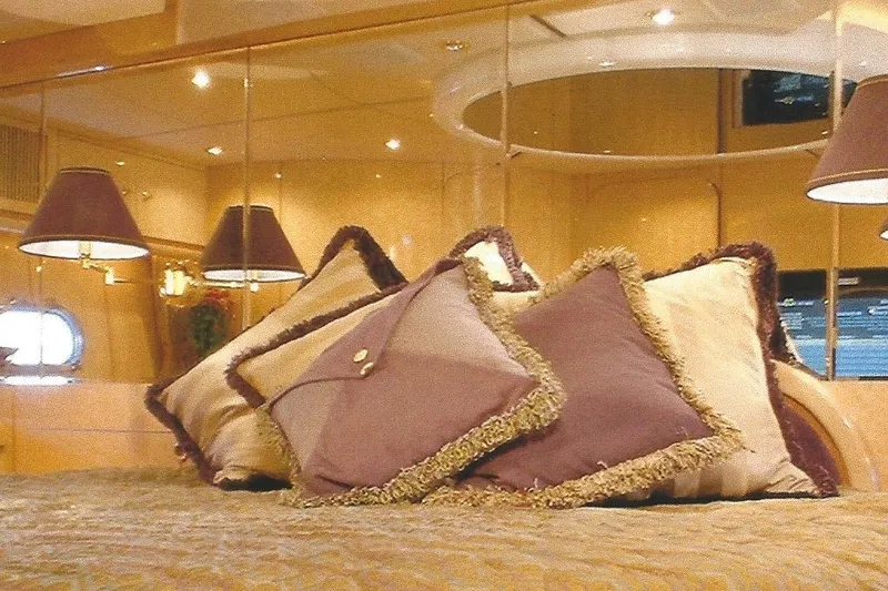Slide: The Image of Luxurious Dyna Laguna yacht interior with plush pillows and elegant lighting. - 56