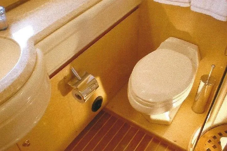 Slide: The Image of Luxurious Dyna Laguna yacht bathroom with wooden flooring and modern fixtures. - 58