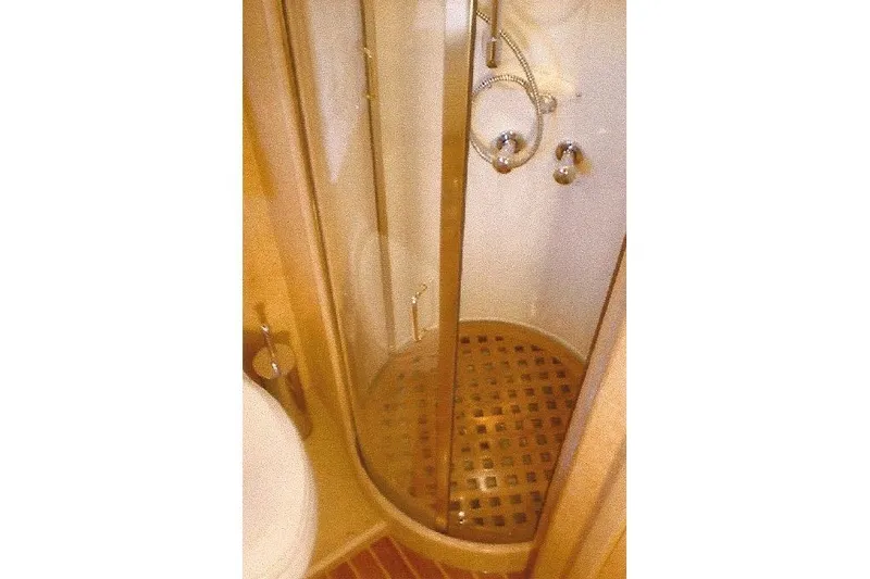 Slide: The Image of Compact shower area with wooden grid floor in Dyna Laguna boat. - 59