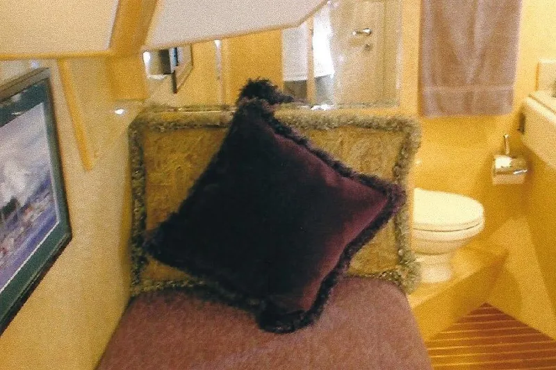 Slide: The Image of Luxurious Dyna Laguna yacht interior with plush seating and elegant bathroom. - 60