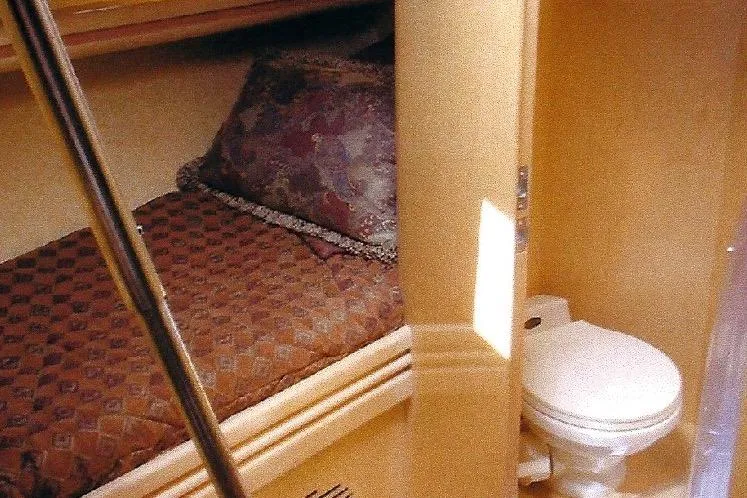 Slide: The Image of Cozy cabin interior of Dyna Laguna yacht with bed and compact bathroom. - 64
