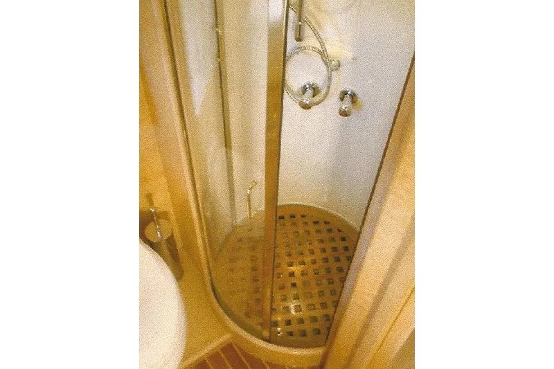 Slide: The Image of Compact shower with wooden floor in Dyna Laguna boat bathroom. - 68