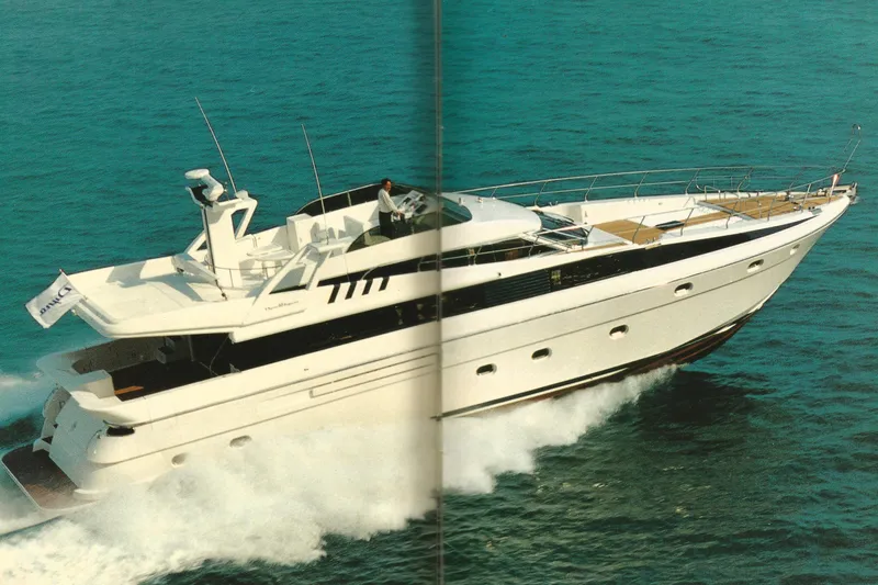 Slide: The Image of Luxury Dyna Laguna yacht cruising on open sea, showcasing sleek design and elegance. - 77