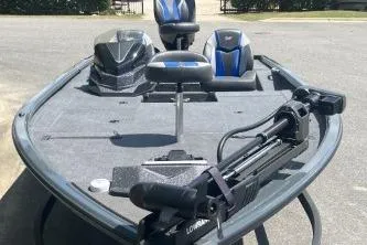 Slide: The Image of 2026 Ranger ALPHA 208 fishing boat with advanced seating and equipment on display. - 5