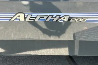Slide: The Image of Ranger ALPHA 208 logo on vehicle, 2026 model, with shadow reflection. - 2