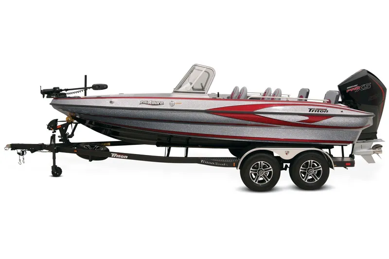 Slide: The Image of 2026 Triton 206 Allure boat on trailer in indoor showroom. - 2