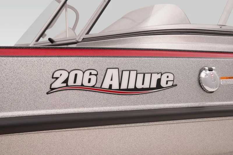 Slide: The Image of 2026 Triton 206 Allure boat interior with red and gray seating, spacious layout. - 9