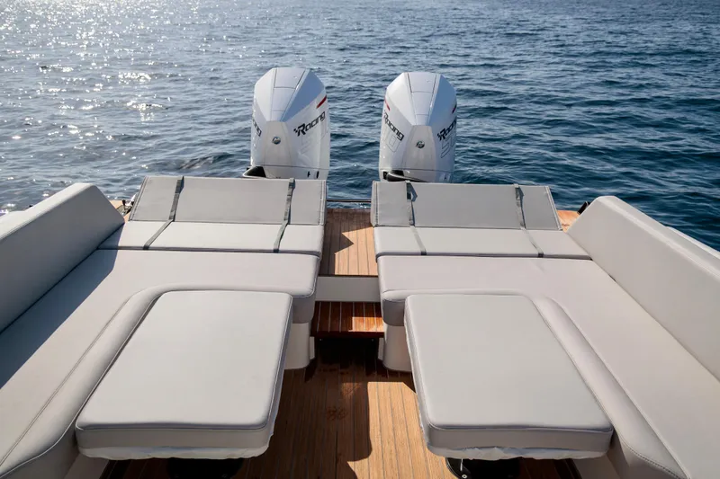 Slide: The Image of Luxurious 2026 Rock Marine RM 40 boat with twin engines and spacious sunbathing area. - 12