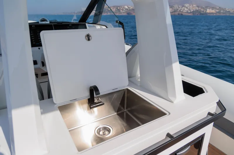 Slide: The Image of 2026 Rock Marine RM 40 yacht with sleek onboard sink and ocean view. - 20