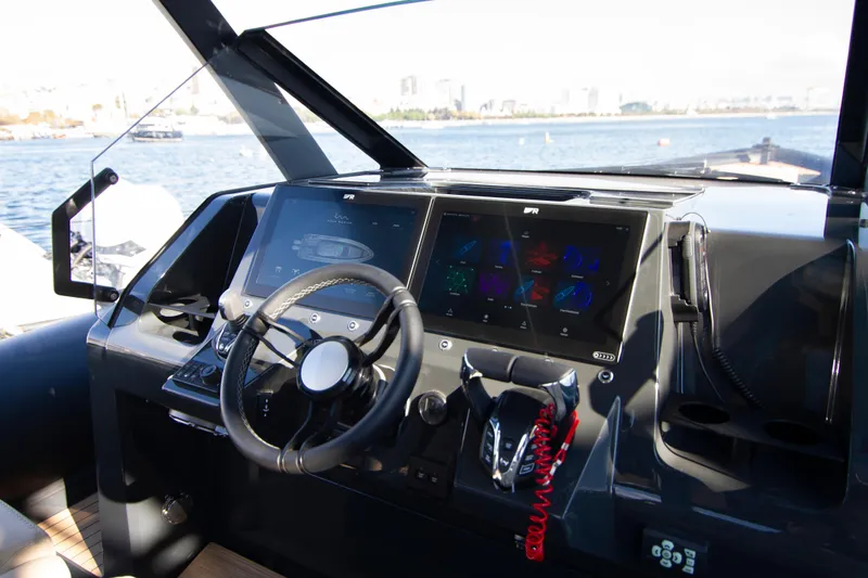Slide: The Image of Helm of 2026 Rock Marine RM 40 boat with advanced navigation displays. - 24