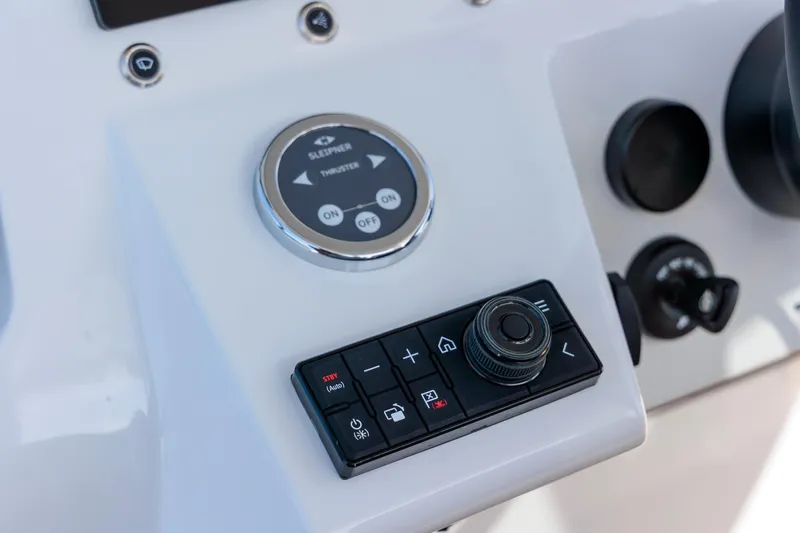 Slide: The Image of Control panel of 2026 Rock Marine RM 40 boat with navigation buttons. - 28