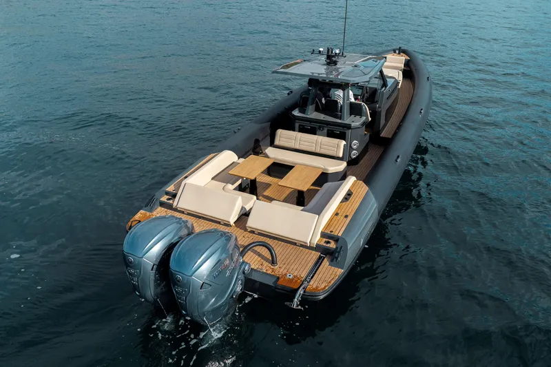 Slide: The Image of 2026 Rock Marine RM 40 boat with dual engines on calm water. - 4