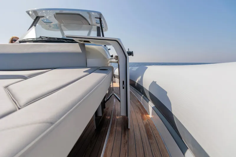 Slide: The Image of 2026 Rock Marine RM 40 luxury boat with sleek design and wooden deck. - 6