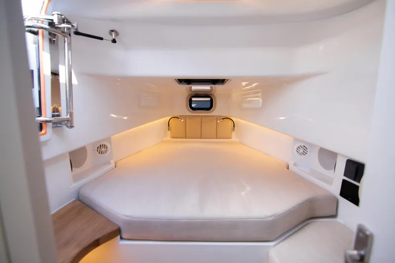 Slide: The Image of Luxurious interior cabin of 2026 Rock Marine RM 40 boat, featuring modern design and ambient lighting. - 9